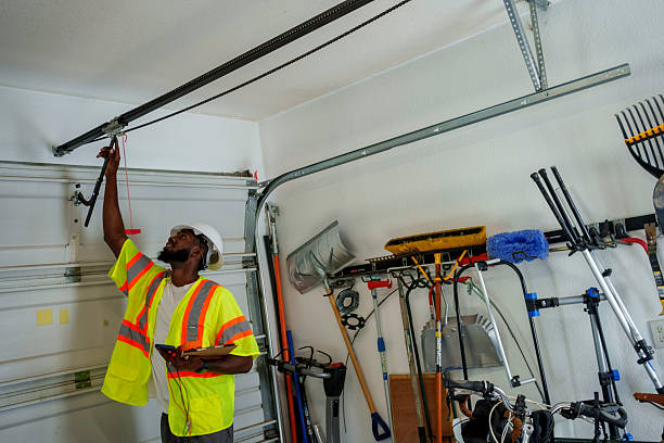 Professional Garage Door Panel Replacement technician working in Renville County County, ND